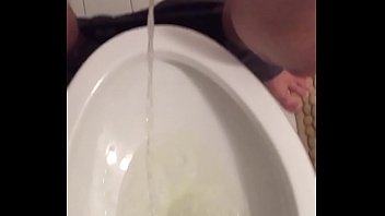 amateur boy pissing in toilet