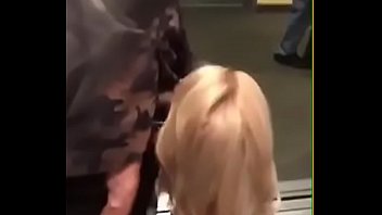 Blonde milf sucking black guy in Elevator in public with others watching