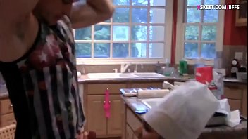 Two teens shared a cock in the kitchen